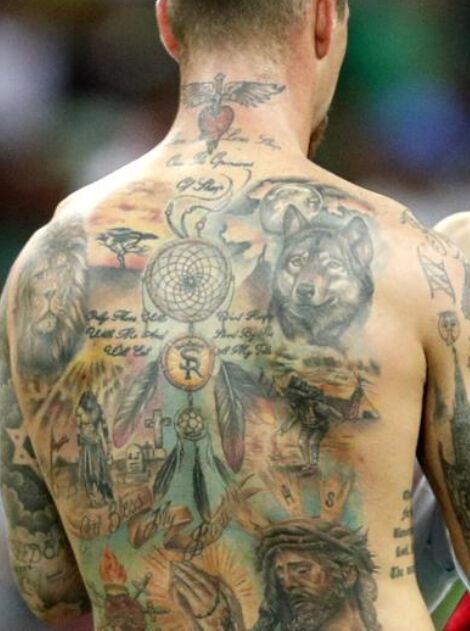 Tattoo of the Great Power on the back of Sergio Ramos