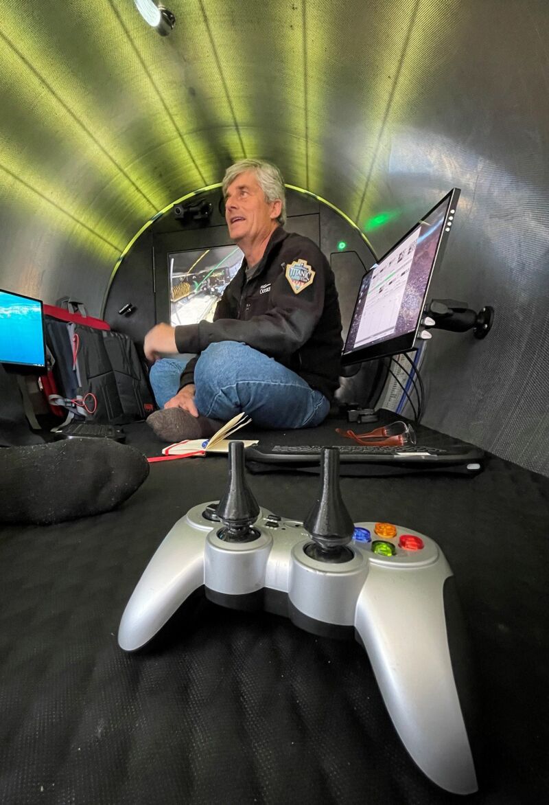 Stockton Rush, CEO of Oceangate Expeditions and one of the disappeared, inside the Titan with the modified Logitech F110.