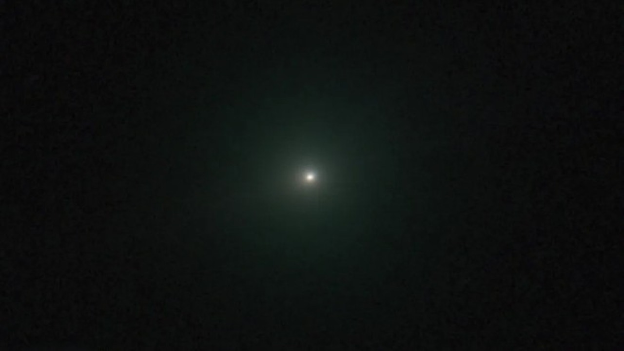 New image of interstellar comet 3I/ATLAS shows it glowing green and tailless