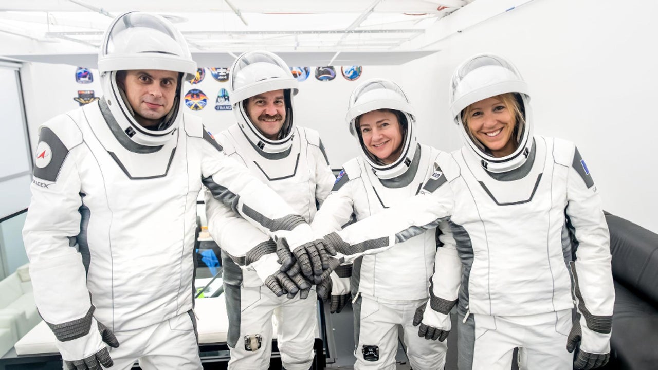 four astronauts replace evacuated crew