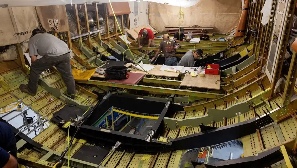 L3Harris installs windows in the cargo hold of the 777 aircraft that will house advanced scientific instruments.
