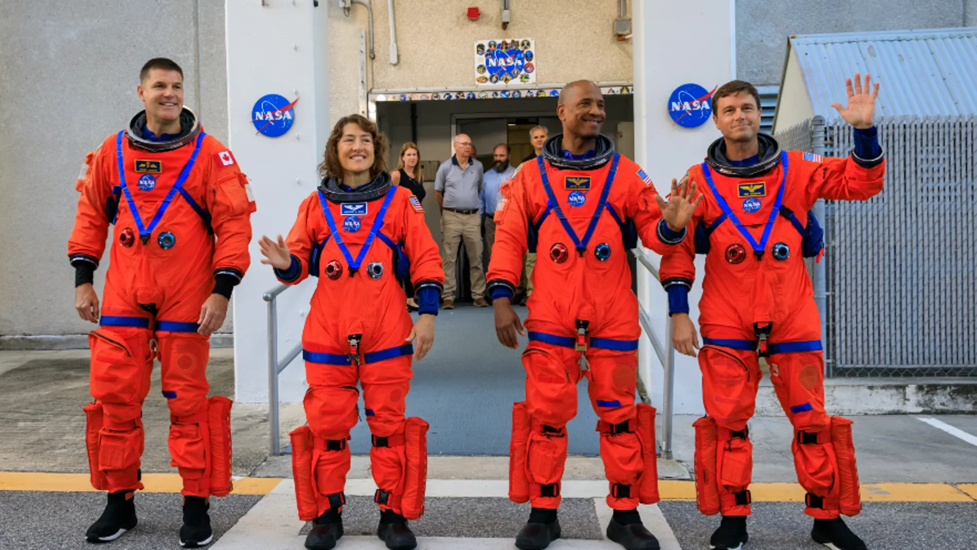 astronauts arrive at the launch base