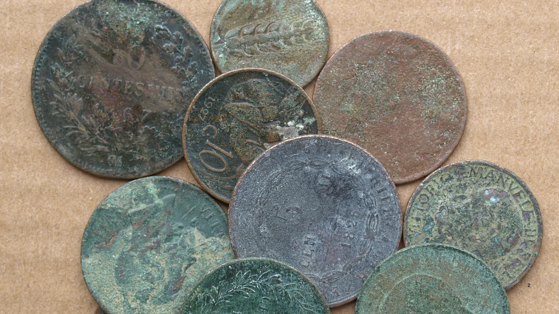 a tombstone from 1711 and a jar full of coins