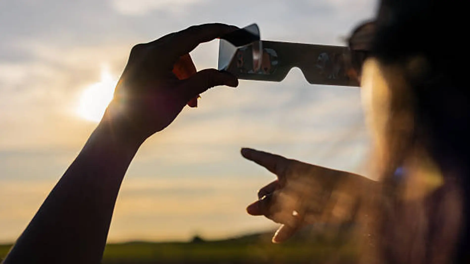 When is it safe to remove your glasses after viewing the eclipse?