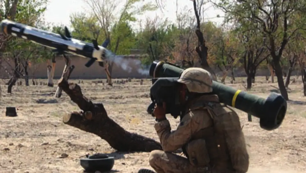 A soldier fires a missile from a Javelin. 