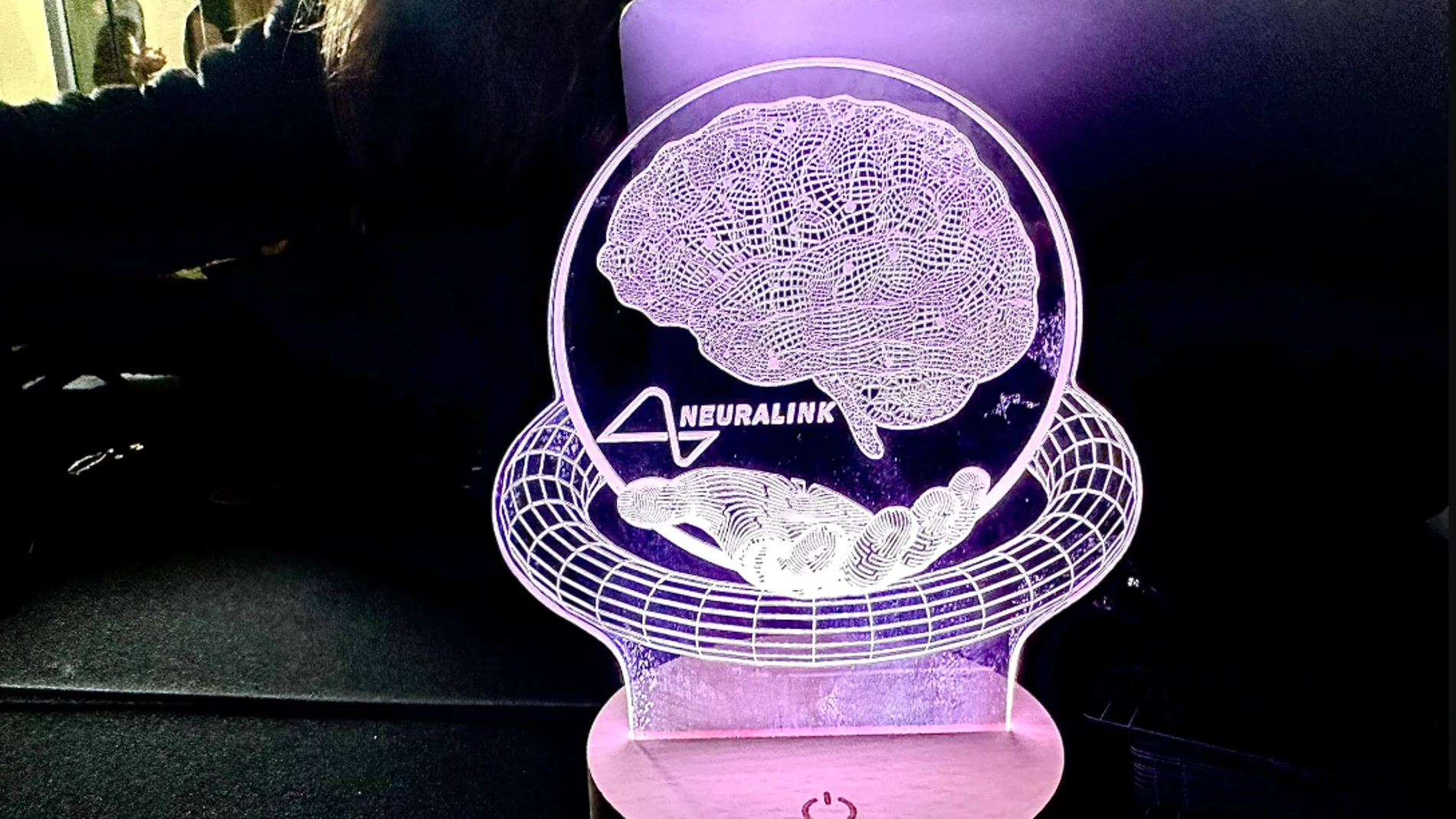 Neuralink teaches an AI using 50,000 hours of neural data. And the goal is obvious